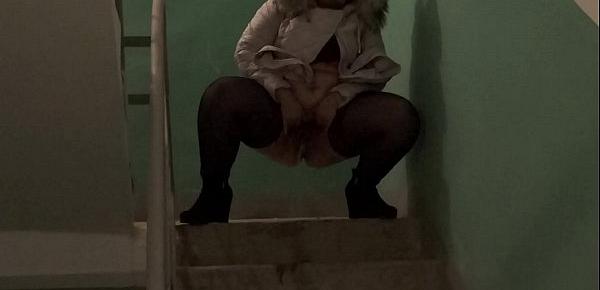 Golden shower in public places, bbw with a big ass and with a hairy pussy pissing on the stairs in the common entrance.